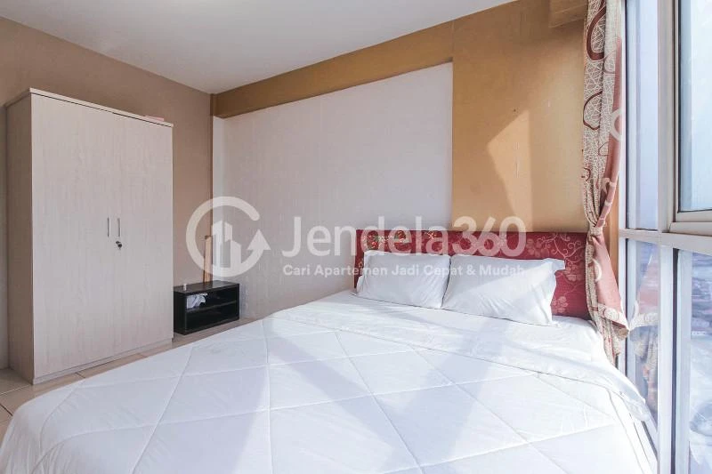 Bedroom 1 Cozy 2BR Apartment at Tifolia Apartment