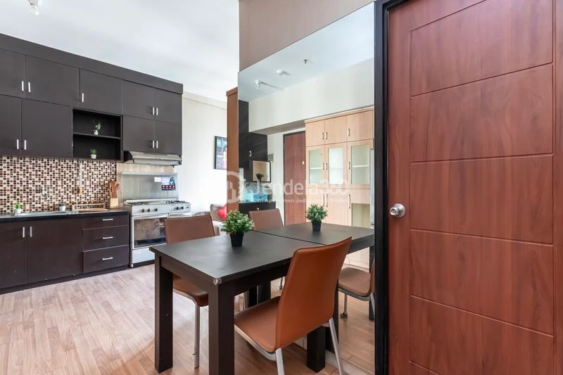 Dining Room High Floor 2BR Apartment with City View at Kebagusan City Apartment