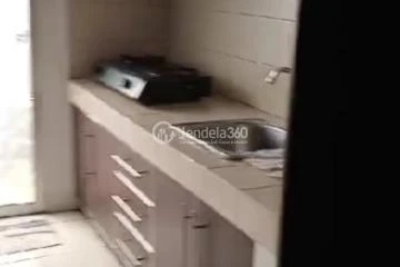 Kitchen Middle Floor 1BR Apartment with City View at Aston Marina Ancol