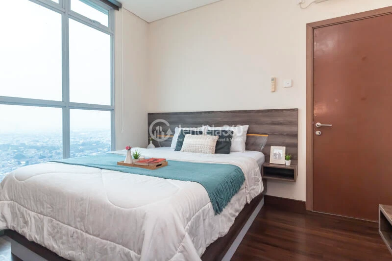 Bedroom 1 High Floor 2BR Apartment with City View at Puri Orchard Apartment