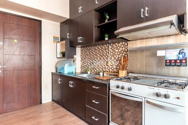 Kitchen High Floor 2BR Apartment with City View at Kebagusan City Apartment