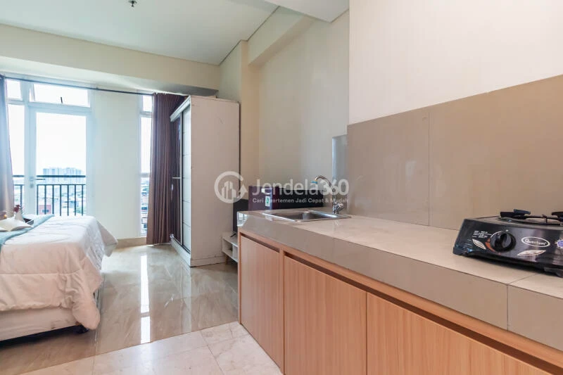 Kitchen Low Floor Studio Apartment with city View at Puri Orchard Apartment