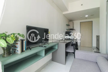 Living Room Low Floor 1BR Apartment with Swimming Pool View at Akasa Pure Living Apartment