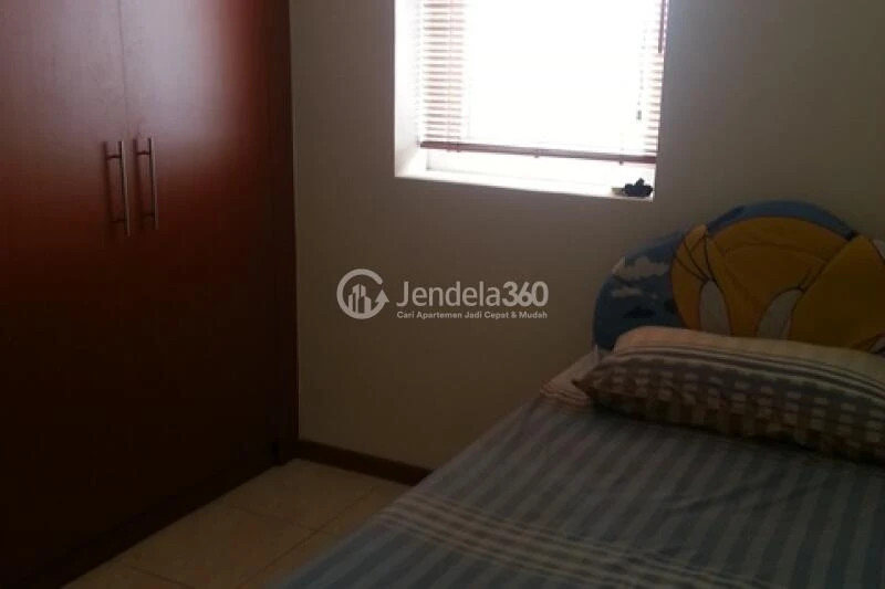 Bedroom 2 High Floor 3BR Apartment with North View at Grand Palace Kemayoran