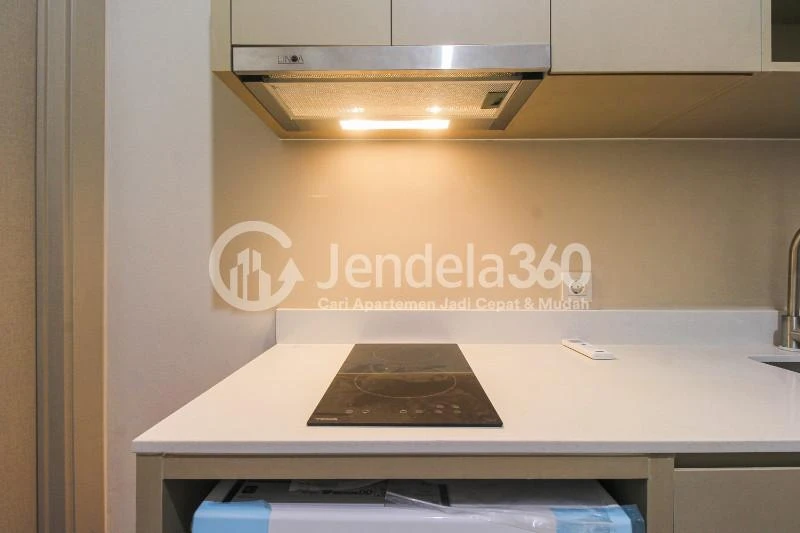 Kitchen 1BR Apartment with City View at Menara Jakarta Apartment