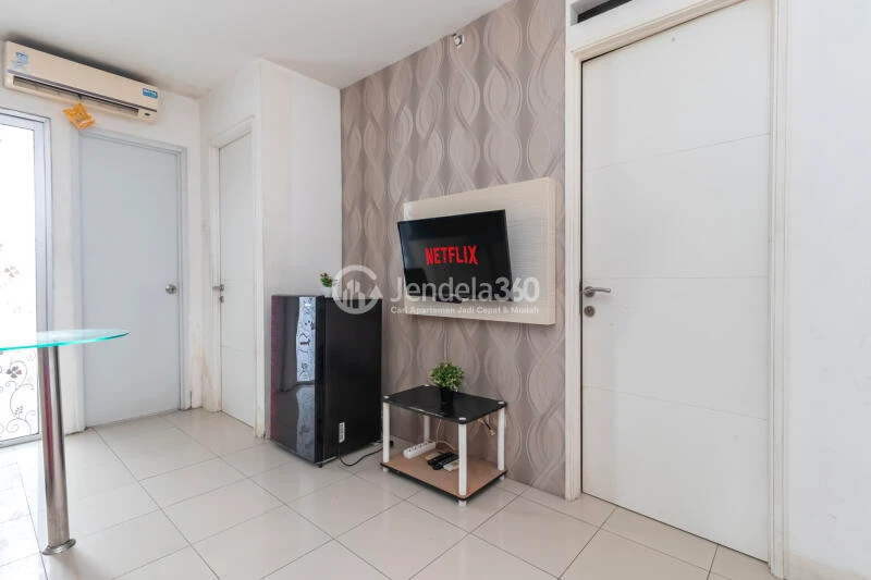 Living Room High Floor 2BR Apartment with CITY View at Bassura City Apartment