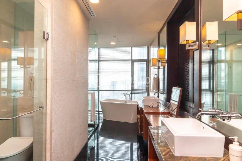 Bathroom Lovely 3BR Apartment at Shangri-La Residence Tower -