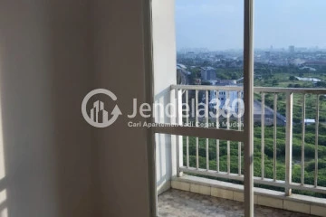 Living Room Middle Floor 1BR Apartment with Pool View at Callia Apartment