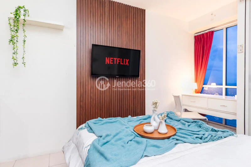 Bedroom Peaceful Studio Apartment High Floor with City View at Tifolia Apartment
