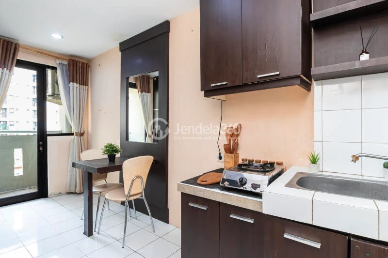 Kitchen Stunning Studio Apartment at Kebagusan City Apartment Middle Floor