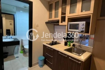 Kitchen Well Furnished Studio Apartment Low Floor with City View at Aspen Residence Apartment