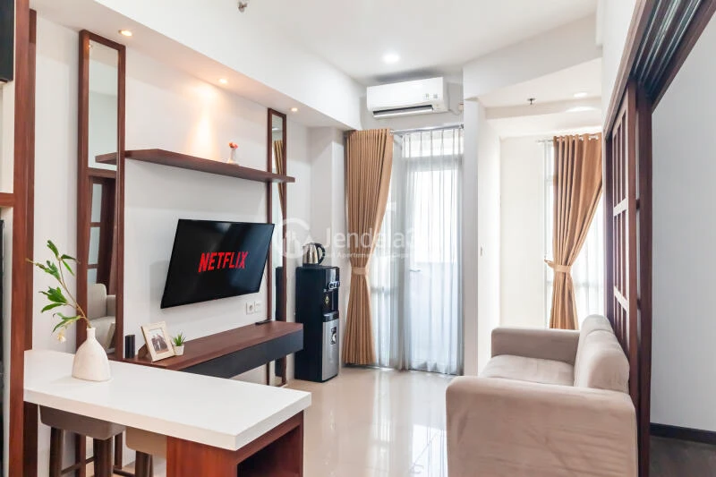 Living Room Homey 1BR Apartment High Floor with  View at Vasanta Innopark Apartment
