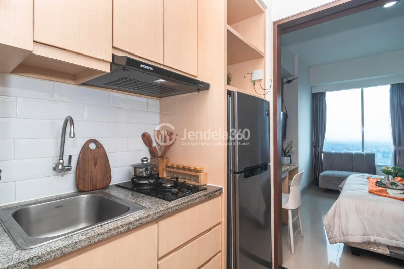 Kitchen Fancy Studio Apartment High Floor with City View at Grand Kamala Lagoon Apartment