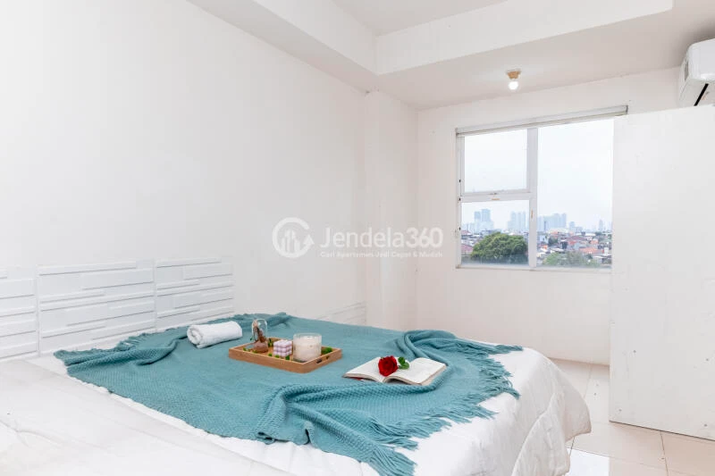 Bedroom 1BR Apartment with City View at Belmont Residence
