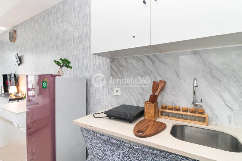 Kitchen Cozy Studio Apartment High Floor with City View at Pacific Garden Apartment