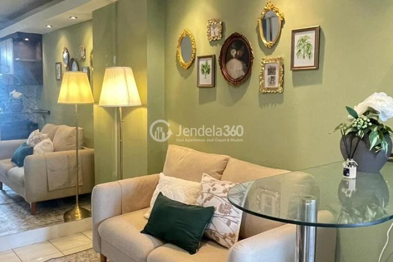 Living Room High Floor 2BR Apartment with City View at Kalibata City Apartment