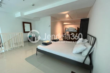 Bedroom High Floor Studio Apartment with City View at Neo Soho Residence