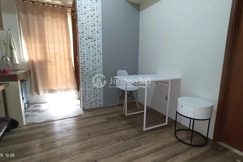 Living Room 1BR Green Lake View Apartment at Tower E