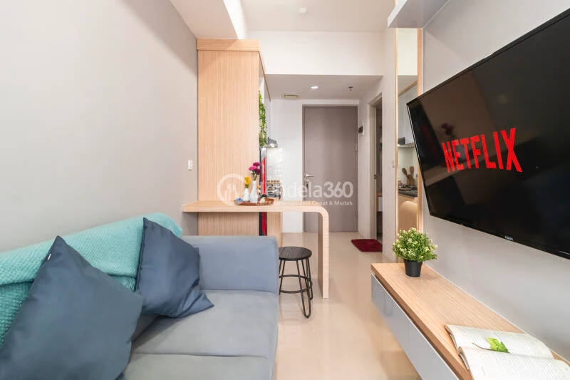 Living Room Strategic Location 1BR Apartment High Floor with City View at Vasanta Innopark Apartment