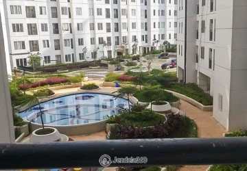 Balcony Modern 1BR Apartment Middle Floor with swimming pool View at Bassura City Apartment