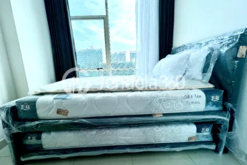 Bedroom 2 2BR Apartment with City View at The Kensington Royal Suites