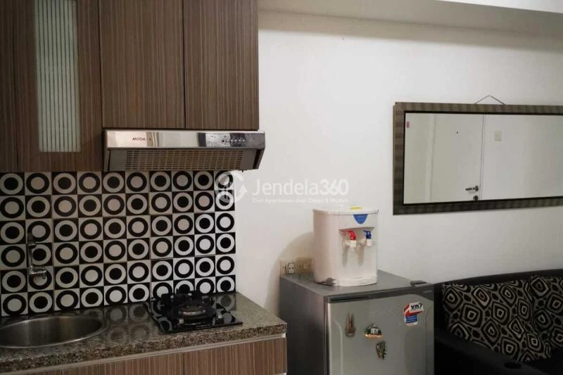 Kitchen Stylish 2BR Apartment at Kalibata City Apartment Middle Floor