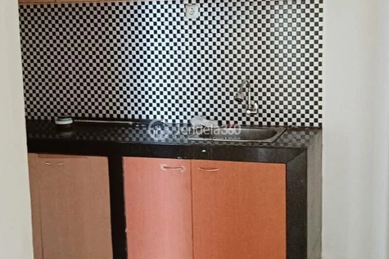 Kitchen 3BR Apartment with - View at Grand Palace Kemayoran
