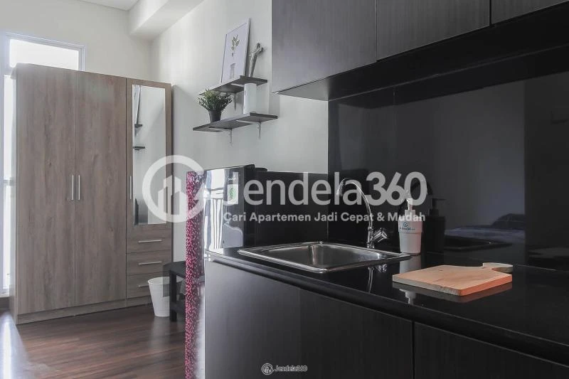 Kitchen Restful Stduio Apartment with City View from The Top Floor at Puri Orchard Apartment