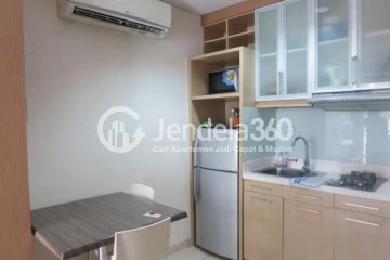 Kitchen Well Located 1BR Apartment Middle Floor with City View at Gardenia Boulevard Apartment