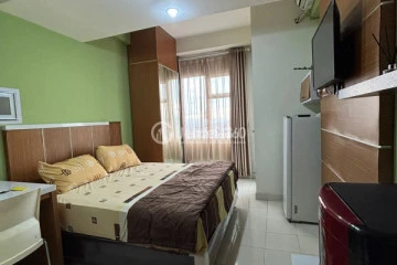 Bedroom Homey Studio Apartment Middle Floor with City View at Easton Park Residence Jatinangor