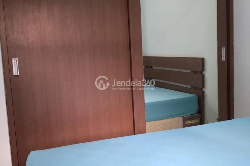 Bedroom 2 Middle Floor 2BR Apartment with Cirt View at Kalibata City Apartment
