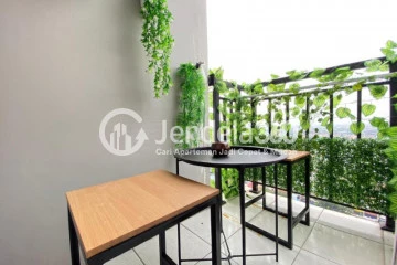 Balcony Elegant 2BR Apartment at Grand Asia Afrika Residence Middle Floor