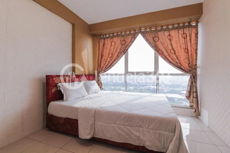 Bedroom 1 Cozy 2BR Apartment at Tifolia Apartment
