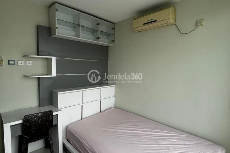 Bedroom 1 Restful 5BR Apartment High Floor with Whoosh Station View at Patria Park Apartment