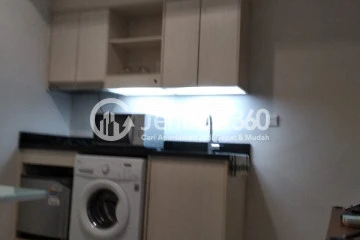 Kitchen Relaxed 1BR Apartment Middle Floor with city View at The Mansion Kemayoran Bougenville