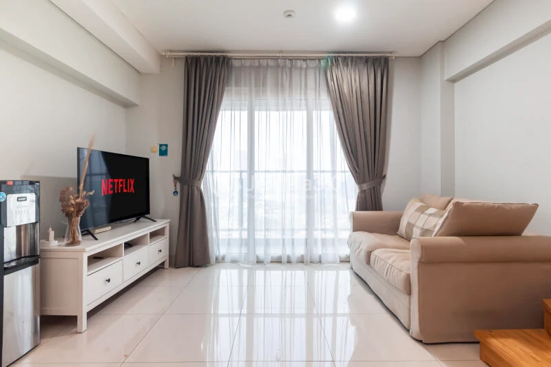 Living Room Strategic Location 2BR Apartment Middle Floor with City View at Maqna Residence
