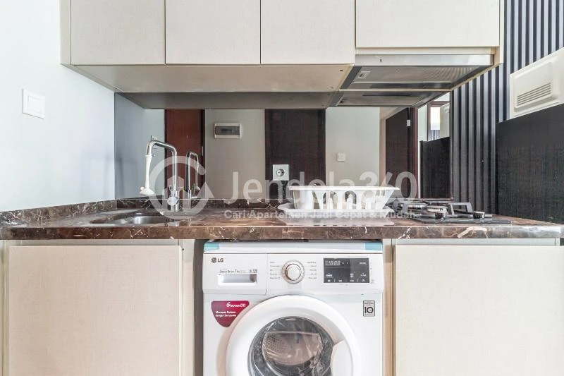 Kitchen Good Deal 2BR Apartment Middle Floor with Pool View at Green Sedayu Apartment