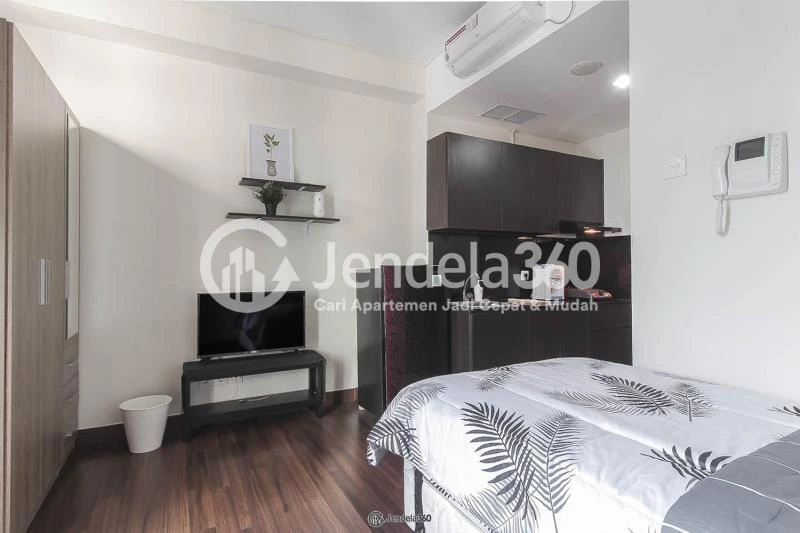 Bedroom Restful Stduio Apartment with City View from The Top Floor at Puri Orchard Apartment