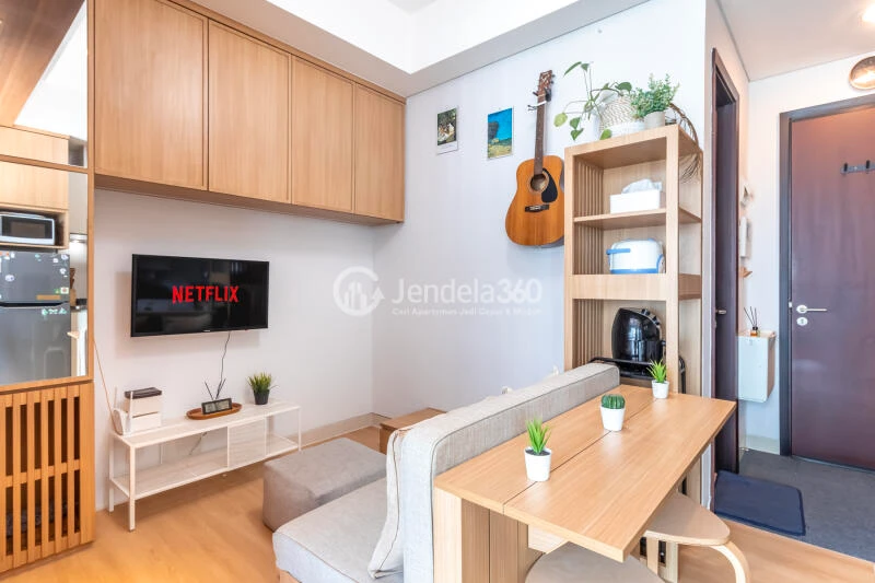 Living Room Affordable 1BR Apartment High Floor with city View at Puri Mansion