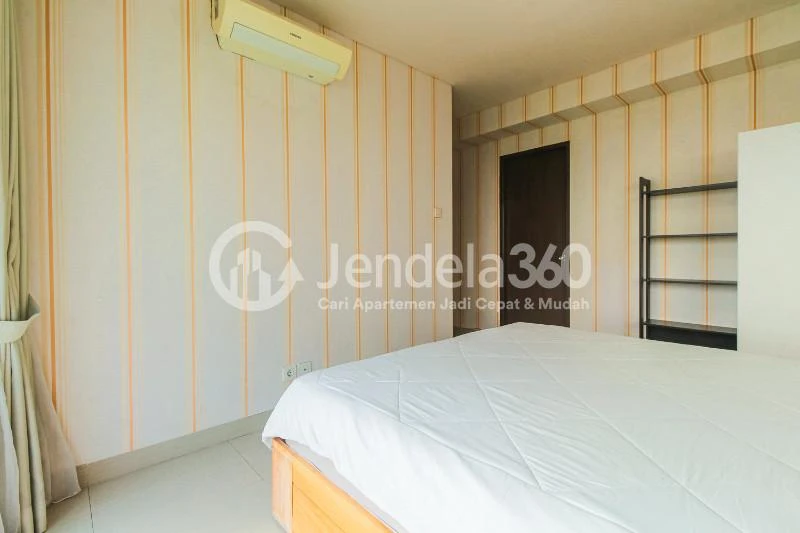 Bedroom 1 High Floor 2BR Apartment with  View at Callia Apartment