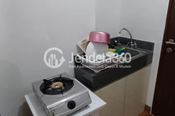 Kitchen Middle Floor Studio Apartment with City View at Transpark Cibubur Apartment