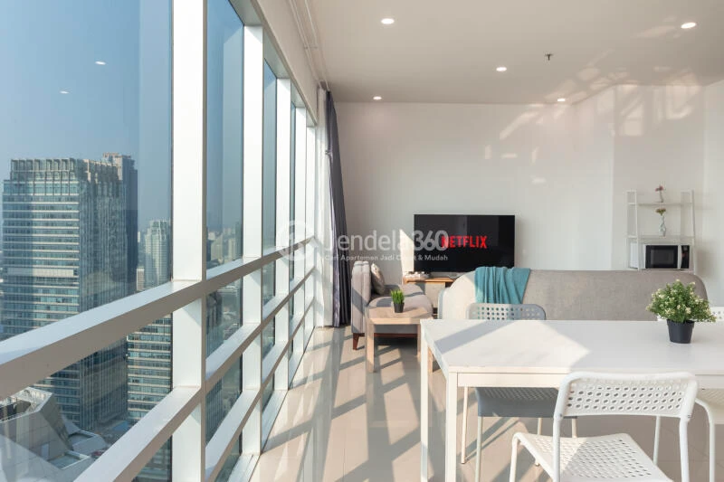 Living Room High Floor 3BR Apartment with City View at Sahid Sudirman Residence
