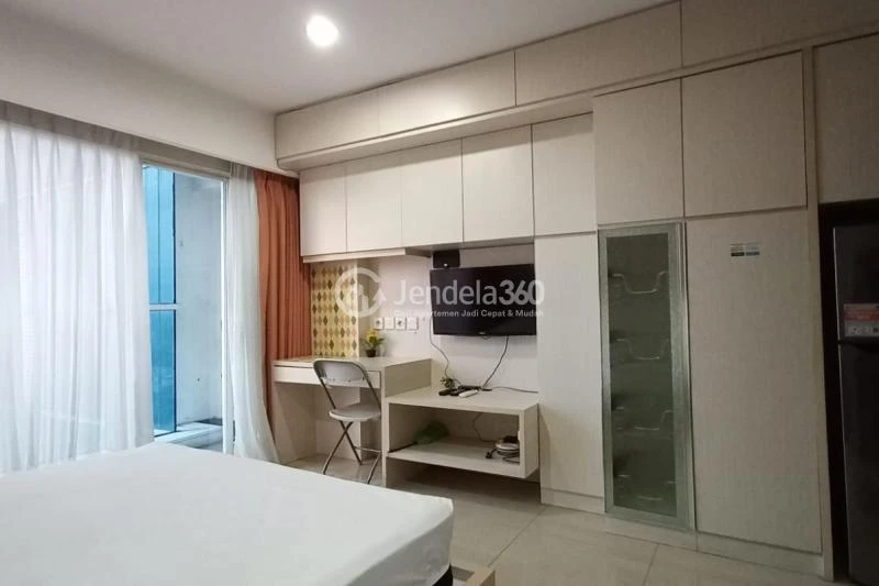 Bedroom Homey Studio Apartment at Tamansari The Hive Middle Floor