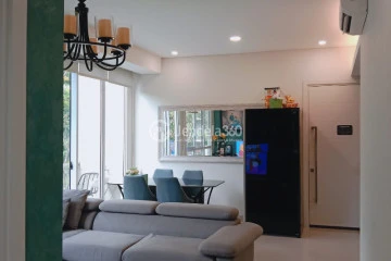 Living Room Compact 2BR Apartment Low Floor with City View at Rainbow Springs Condovillas