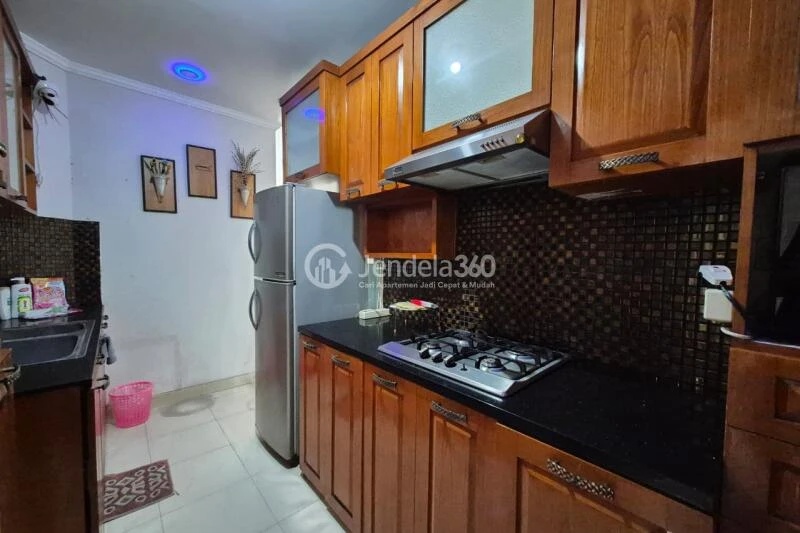 Kitchen 3BR Apartment with City View at Permata Hijau Residence