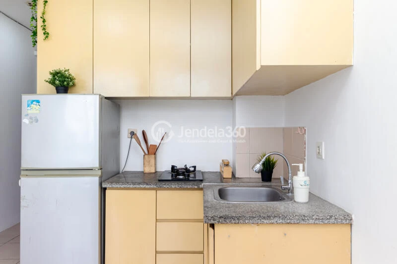 Kitchen 2BR Apartment with - View at Tifolia Apartment