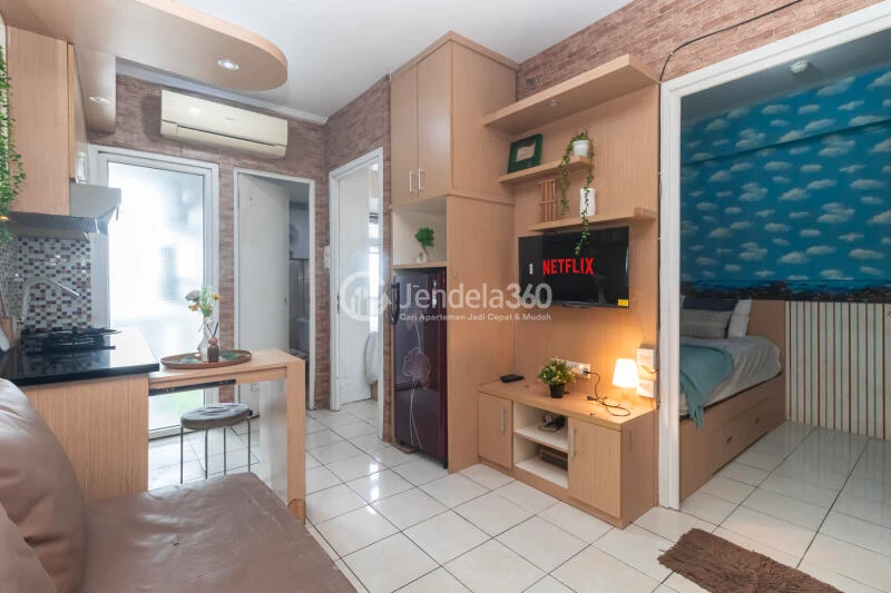 Living Room Relaxed 2BR Apartment Low Floor with  View at Green Pramuka City Apartment