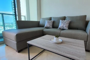 Living Room Middle Floor 3BR Apartment with Pool View at The Kensington Royal Suites