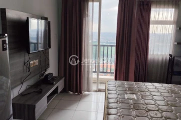Bedroom Peaceful Studio Apartment High Floor with City View at Kota Ayodhya Apartment
