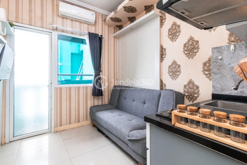 Living Room High Floor 2BR Apartment with City View at Green Pramuka City Apartment